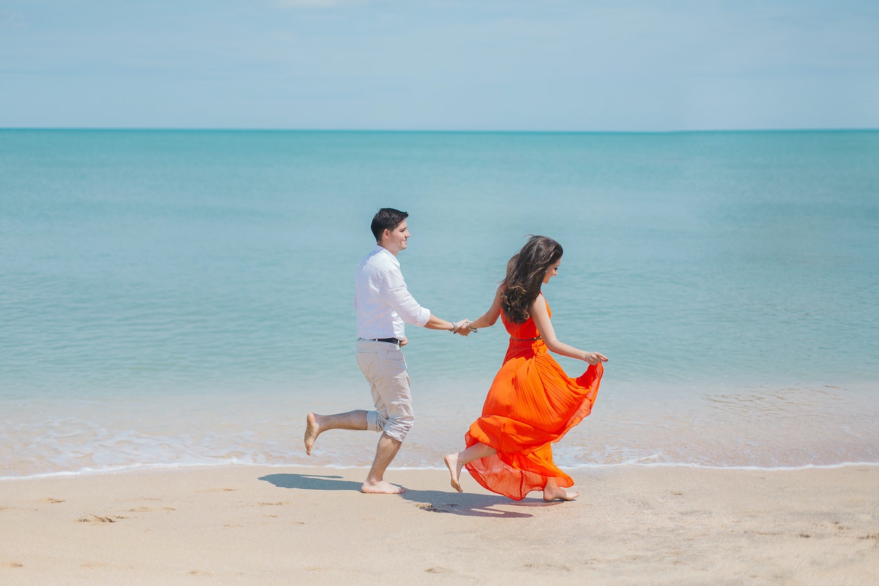 man and woman on the beach - relationship counselling