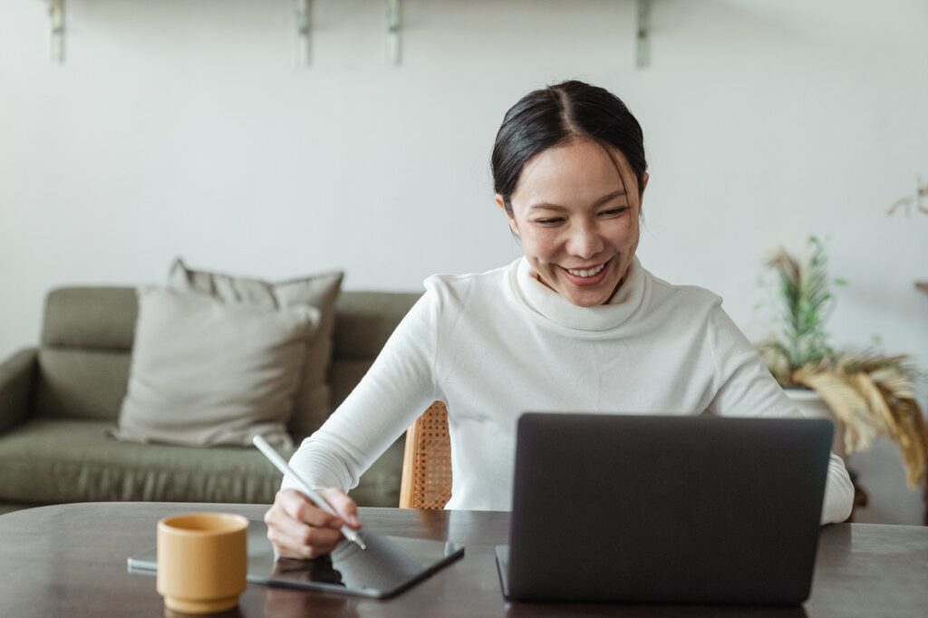 workplace wellbeing - happy woman